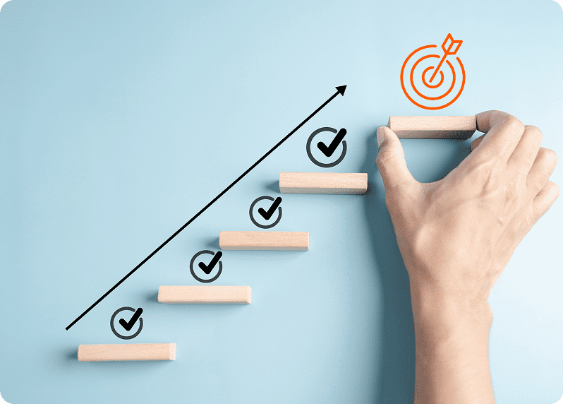 A hand places the last wooden block on a staircase of blocks with check marks, leading to a target symbol with an arrow in the center, against a blue background.